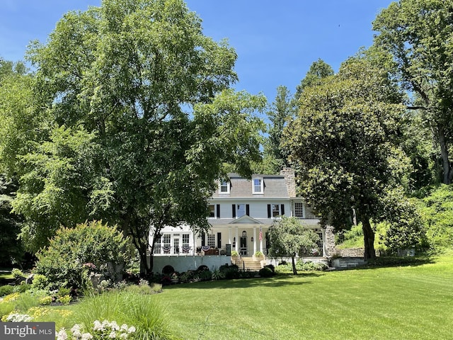 colonial house with a front lawn