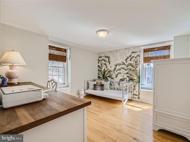 bedroom with light wood-type flooring