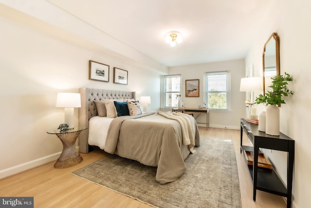 bedroom with light hardwood / wood-style floors