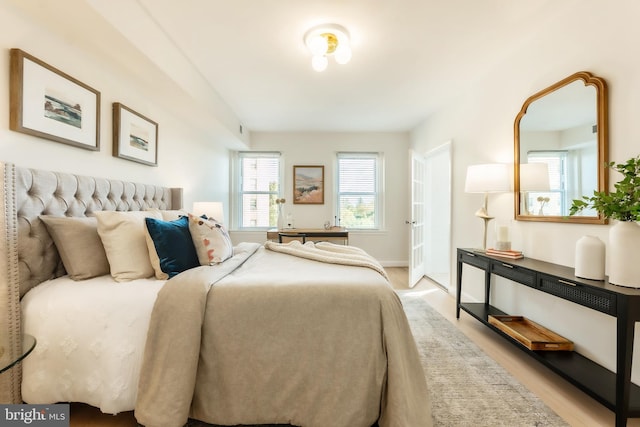 bedroom with light wood-type flooring