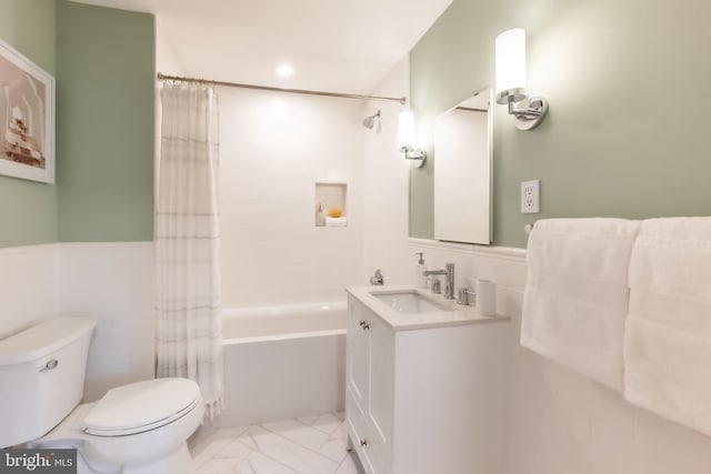 full bathroom featuring toilet, tile walls, shower / bath combo, and vanity