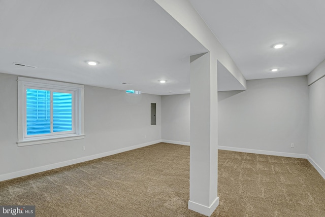 basement with light colored carpet