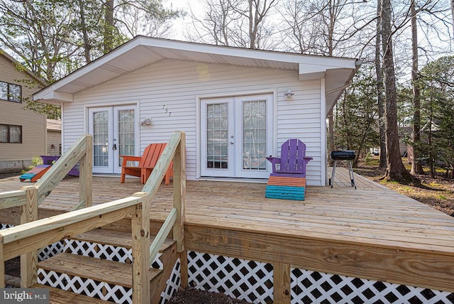 wooden deck featuring french doors