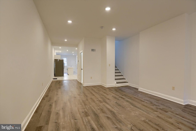 unfurnished room featuring dark hardwood / wood-style flooring