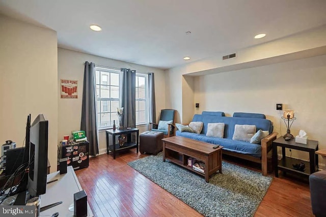 living room featuring dark hardwood / wood-style floors