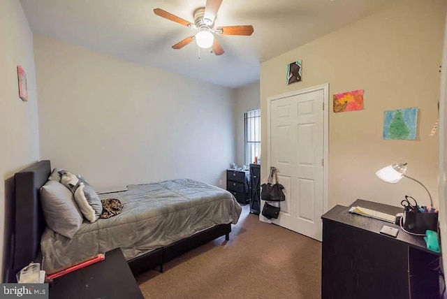 carpeted bedroom featuring ceiling fan