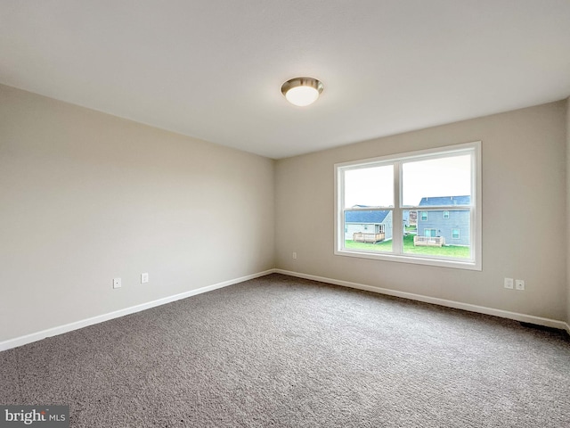 view of carpeted spare room