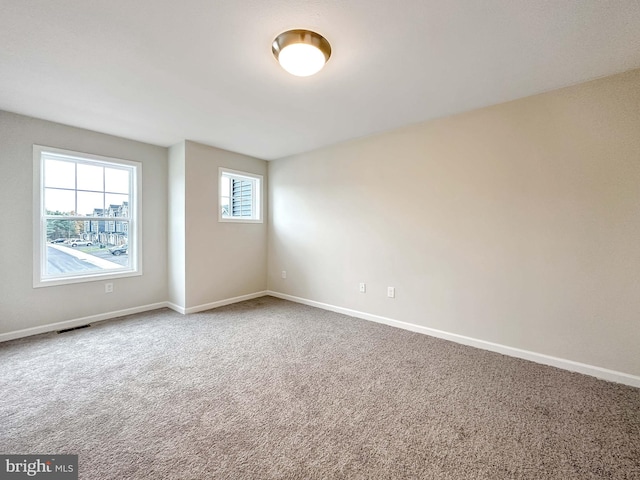 view of carpeted spare room