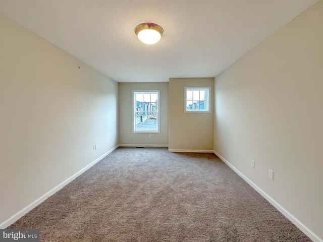 view of carpeted spare room