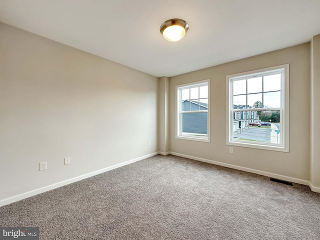 view of carpeted spare room