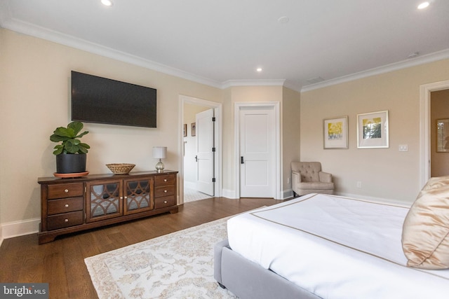 bedroom featuring dark wood-type flooring and crown molding