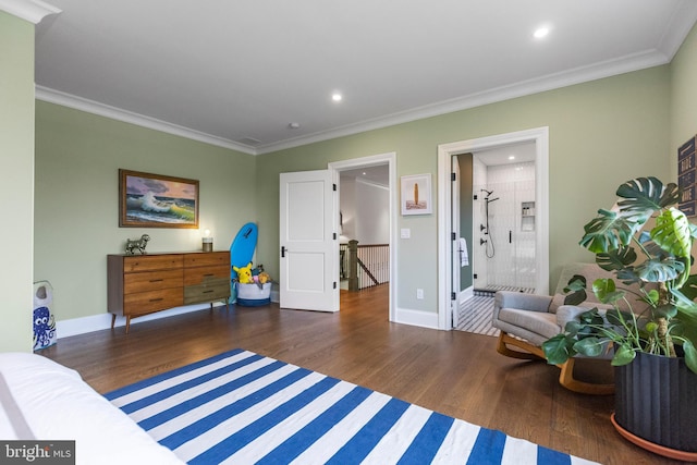 sitting room featuring ornamental molding and dark wood-type flooring