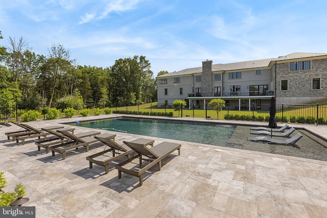 view of pool with a patio