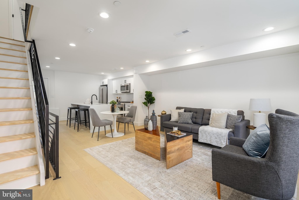 living room featuring light wood-type flooring