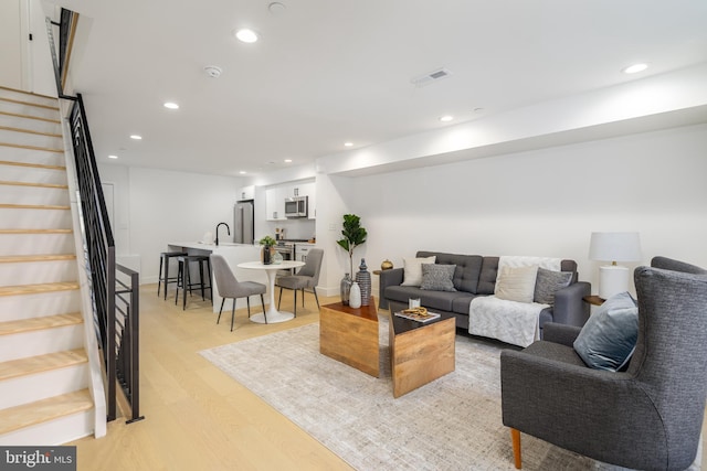 living room featuring light wood-type flooring