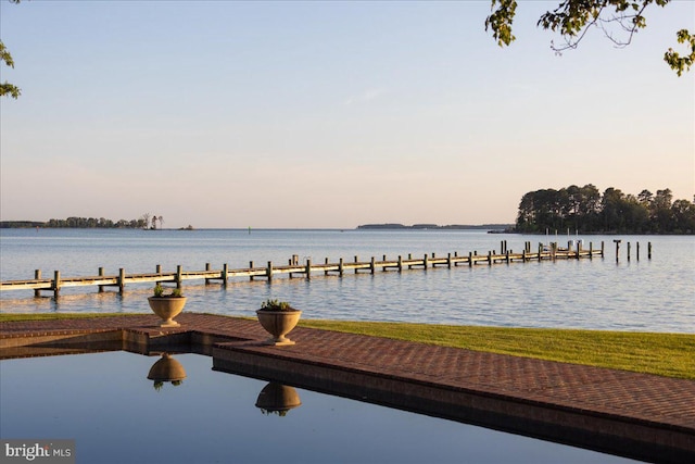 view of water feature with a boat dock