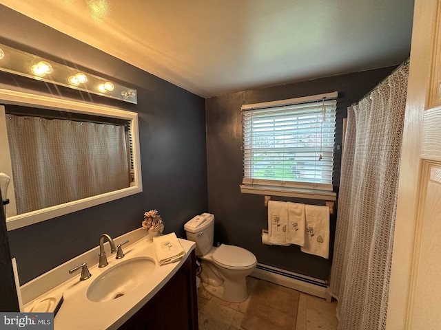 bathroom featuring a baseboard heating unit, tile flooring, vanity, and toilet