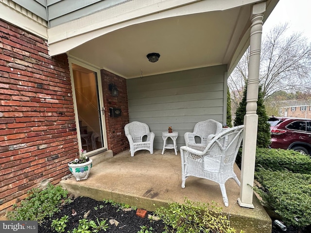 view of terrace featuring covered porch