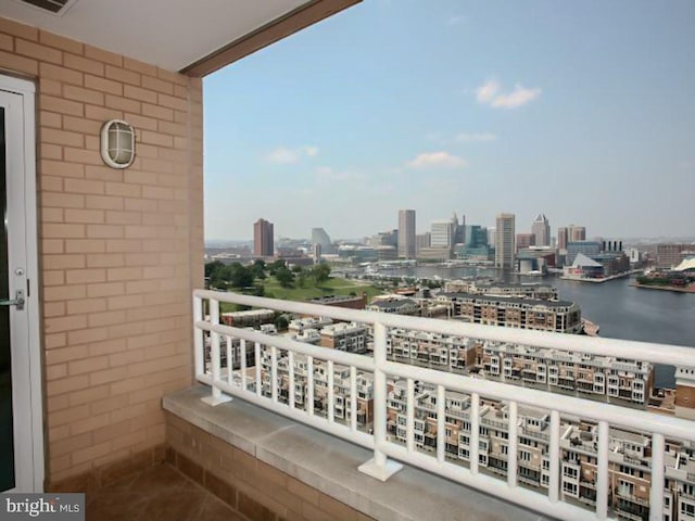 balcony featuring a water view