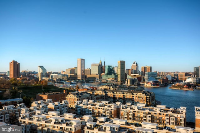 property's view of city with a water view