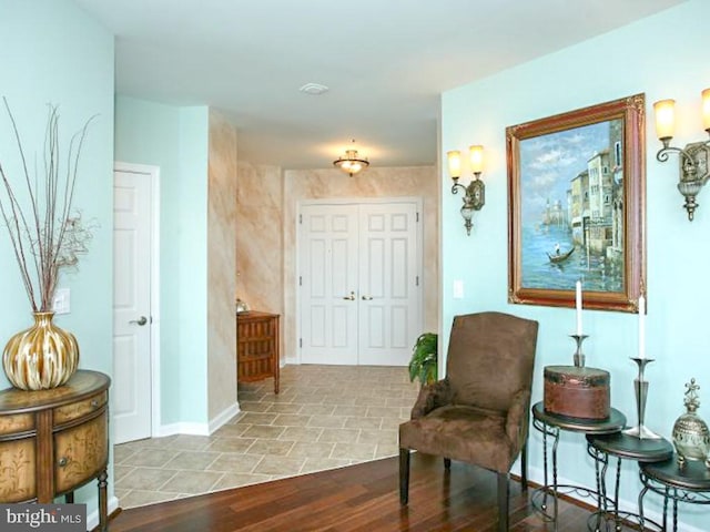 sitting room with light tile floors