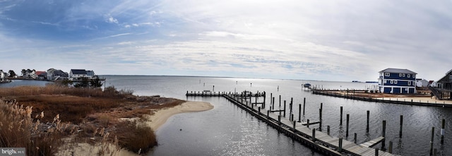 view of dock with a water view