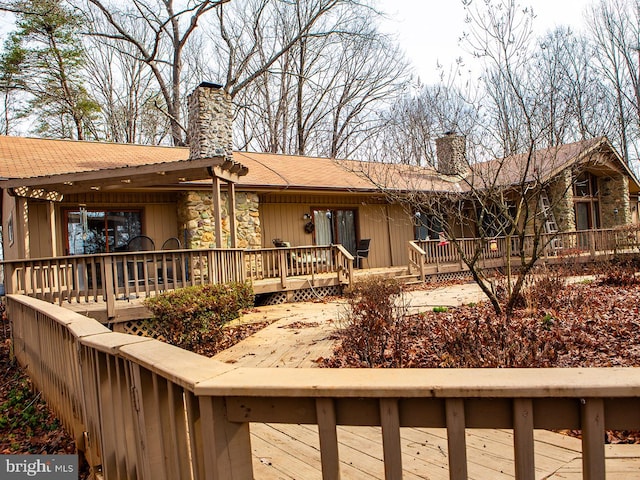 view of front of house with a wooden deck