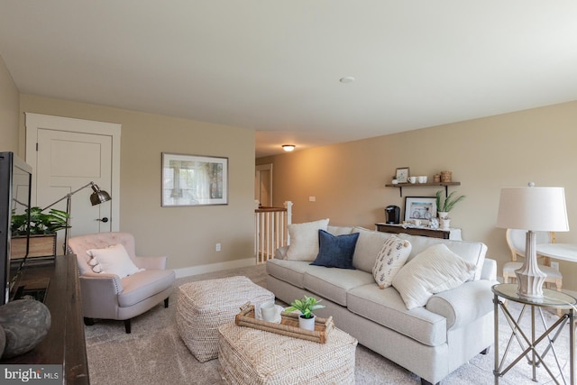 living room featuring light colored carpet