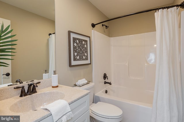 full bathroom featuring toilet, vanity, and shower / bath combo with shower curtain