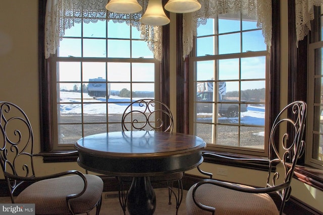 dining room with a notable chandelier