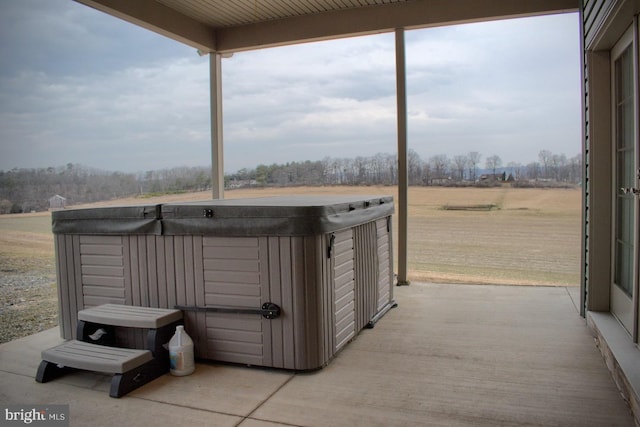 view of patio featuring a hot tub