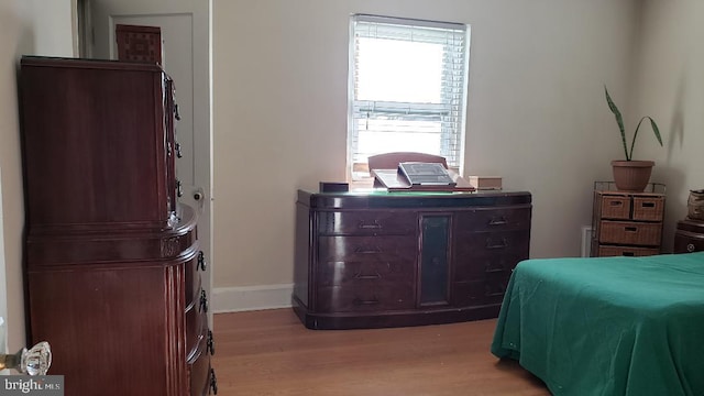 bedroom featuring light wood-type flooring