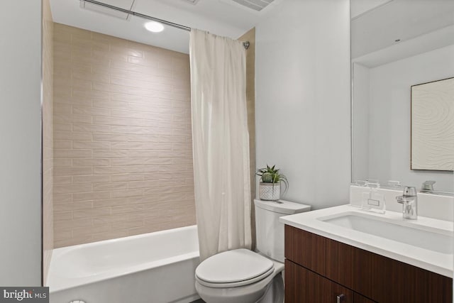 full bathroom with shower / bathtub combination with curtain, toilet, and vanity