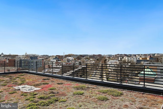 view of yard featuring a balcony