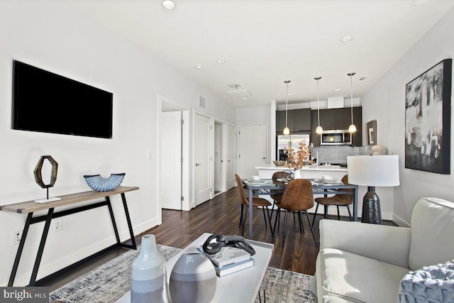 living room featuring dark hardwood / wood-style floors