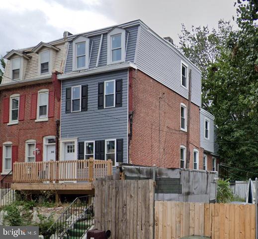 view of front of house with a wooden deck