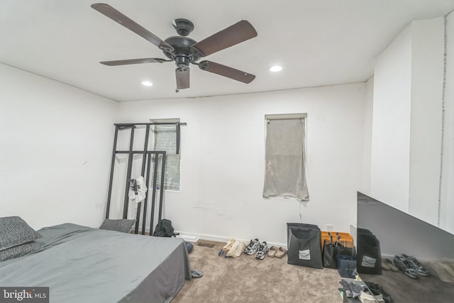 carpeted bedroom featuring ceiling fan