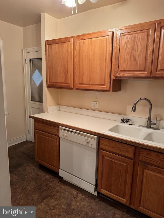 kitchen featuring dishwasher, ceiling fan, and sink