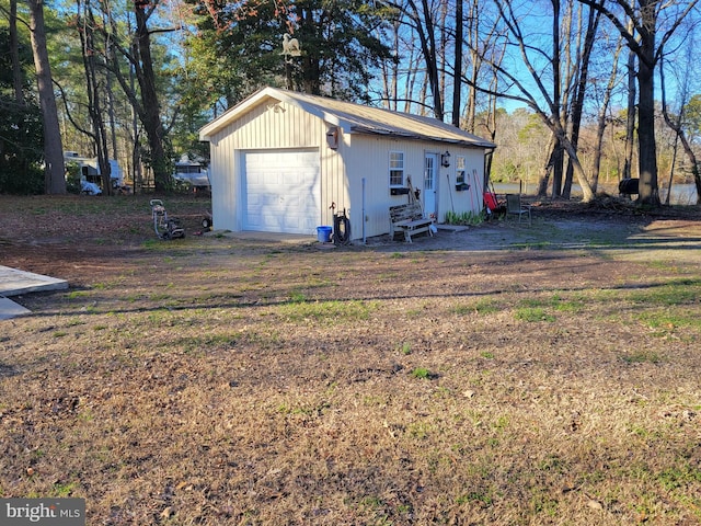 view of outdoor structure with a garage