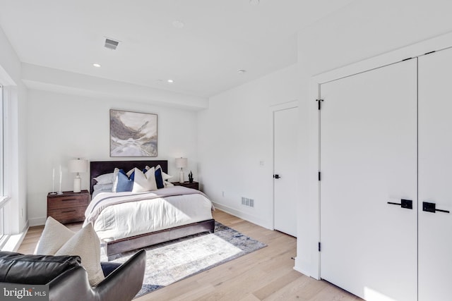 bedroom with light hardwood / wood-style flooring