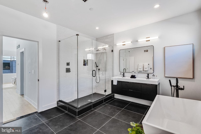 bathroom with tile flooring, independent shower and bath, and double vanity