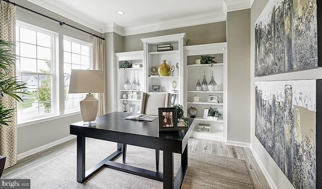 office featuring light hardwood / wood-style flooring and ornamental molding