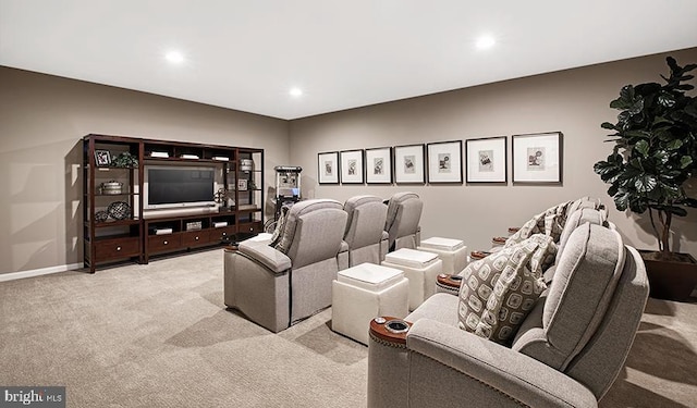 home theater featuring light colored carpet