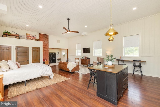 bedroom with dark wood-type flooring