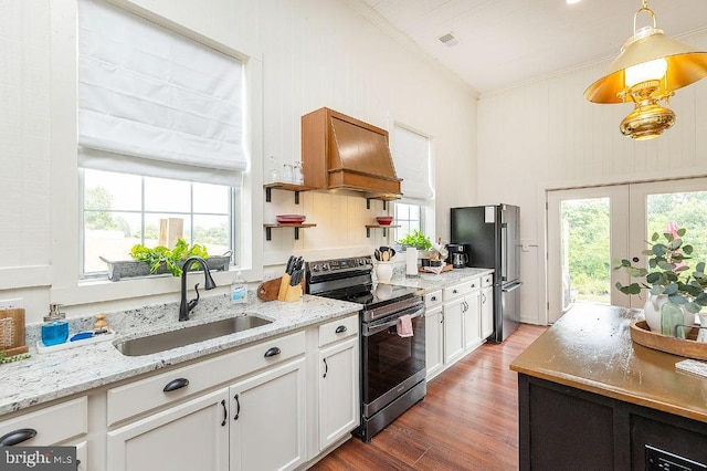 kitchen with hanging light fixtures, stainless steel appliances, sink, dark hardwood / wood-style floors, and white cabinets