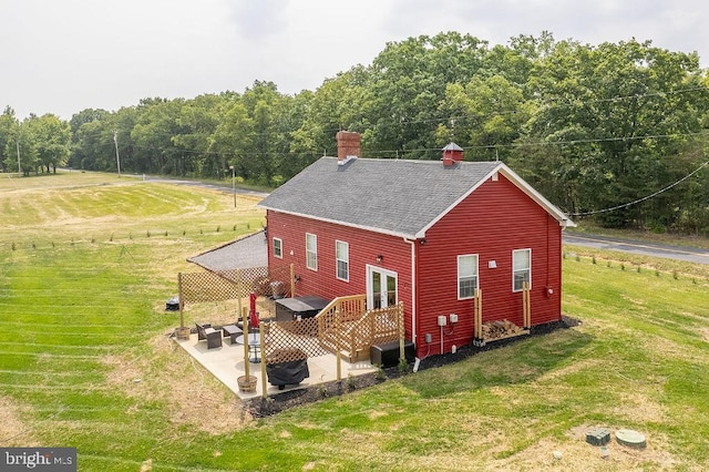 view of shed / structure featuring a yard