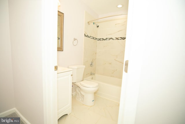 full bathroom with vanity, toilet, and tiled shower / bath