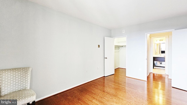 bedroom featuring light hardwood / wood-style flooring and a closet