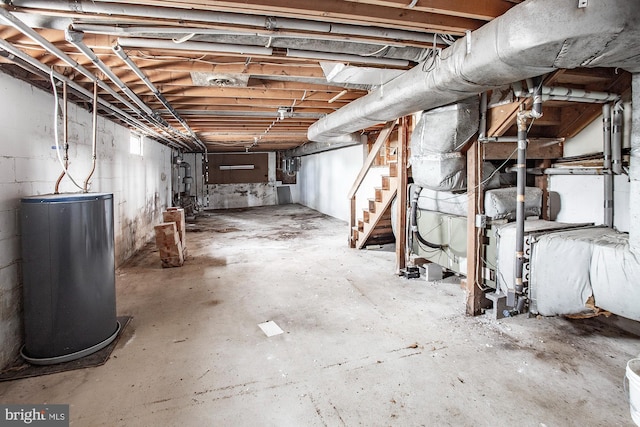 basement featuring water heater