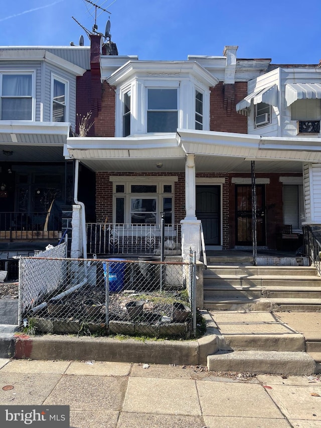 view of property featuring a porch